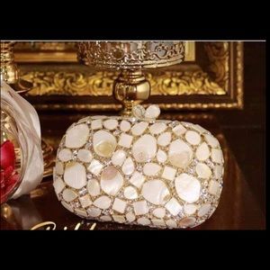 Clutch made with Semi precious stones.